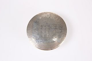 A SILVER COMPACT, circular, the hinged cover engr