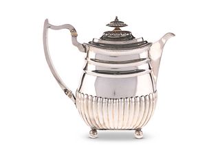 A GEORGE III SILVER HOT WATER JUG, by William Ben