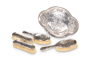 AN EDWARDIAN SILVER DRESSING TABLE SET, by Willia