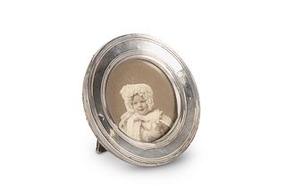AN EDWARDIAN SILVER-MOUNTED PHOTOGRAPH FRAME, by 