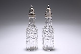 A PAIR OF VICTORIAN SILVER-TOPPED CUT-GLASS CASTE