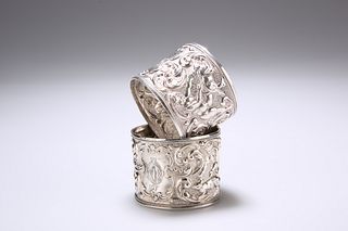 A PAIR OF EDWARDIAN SILVER NAPKIN RINGS, by Crisf