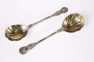 A PAIR OF VICTORIAN SILVER-GILT SERVING SPOONS, b
