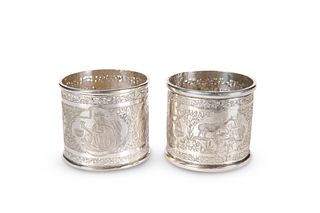 A PAIR OF LARGE PERSIAN SILVER NAPKIN RINGS, each
