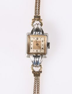A VINTAGE MOVADO LADY'S WRIST WATCH WITH 9 CARAT 
