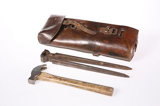 A LEATHER-CASED SET OF FARRIER'S TOOLS FOR SADDLE