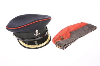 AN OFFICER'S PATTERN PEAKED CAP OF THE GREEN HOWA