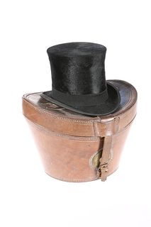 A TOP HAT BY C.J. HARDY, LEEDS, IN A LEATHER HAT 