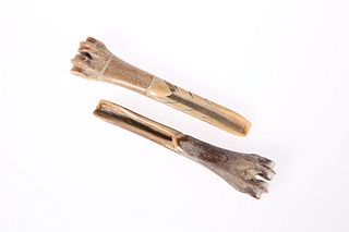 TWO CARVED BONE APPLE CORERS, probably 17th Centu