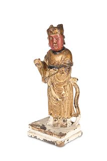 A CHINESE CARVED PARCEL-GILT FIGURE, 19TH CENTURY