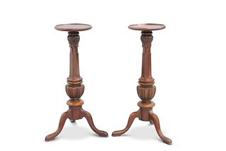A PAIR OF VICTORIAN MAHOGANY TORCHERES, each with