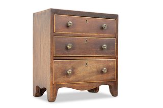 AN EARLY 19TH CENTURY MAHOGANY MINIATURE CHEST OF