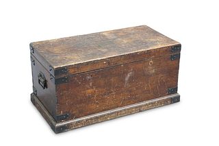 A 19TH CENTURY IRON-BOUND OAK TRUNK, with twin lo