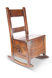 AN 18TH CENTURY OAK CHILD'S ROCKING CHAIR, the bo