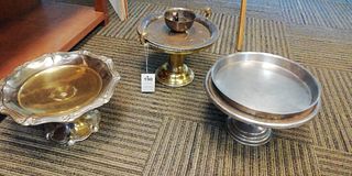 Lot of 3 dessert stands. 20th century. Different designs. Made in silver and gold metals. Decorated.