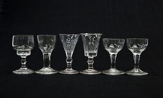 SIX 18TH CENTURY GIN GLASSES
 Each with folded fo