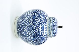 A CHINESE BLUE AND WHITE VASE AND COVER
 Of balus