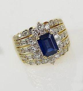 Lady's Levian 1.50 Carat Emerald Cut Sapphire, 1.0 Carat Round Cut Diamond and 18 Karat Yellow Gold Ring