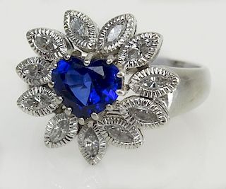 Lady's Heart Shape Sapphire, Diamond and Platinum Ring