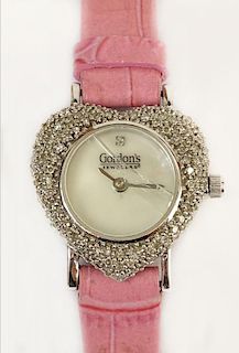 Lady's Gordon's Jewelers 14 Karat White Gold and Pave set Diamond Heart Shape Quartz Movement Watch