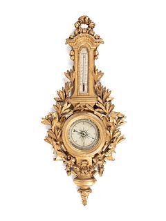 A Louis XV Style Carved Giltwood Barometer and Thermometer