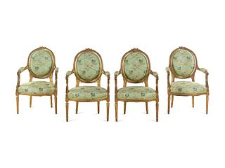 A Set of Four Louis XVI Style Carved Giltwood Fauteuils