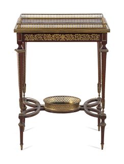 A Louis XVI Style Gilt Bronze Mounted Mahogany Table