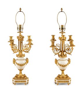 A Pair of Louis XVI Style Gilt Bronze and White Marble Six-Light Candelabra