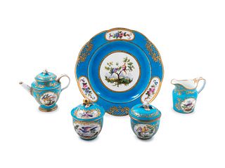 Five Sevres Painted and Parcel Gilt Celeste Blue-Ground Porcelain Tea Service Articles