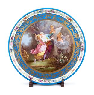 A Sevres Style Painted and Parcel Gilt Porcelain Charger
