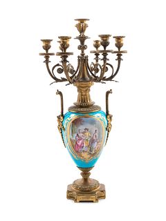 A Sevres Style Gilt Bronze Mounted Painted and Parcel Gilt Celeste-Blue Ground Painted Porcelain Seven-Light Candelabrum