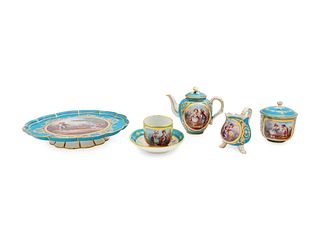 A Sevres Style Painted and Parcel Gilt Porcelain Tea Service