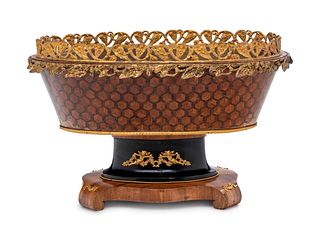 A Napoleon III Gilt Metal Mounted, Parcel Ebonized and Parquetry Jardiniere