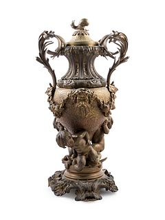A Napoleon III Style Parcel Gilt Bronze Covered Urn