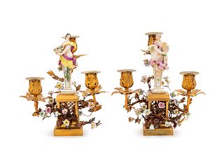 A Pair of German Gilt Metal Mounted Painted Porcelain Three-Light Candelabra