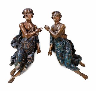 A Pair of Continental Polychrome Painted and Parcel Gilt Carved Wood Figures