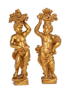 A Pair of Continental Carved Giltwood Putti Figures