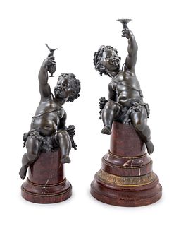 A Pair of Continental Patinated Bronze Bacchic Putto Figures