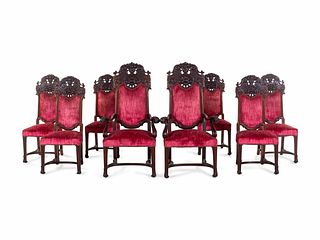 A Set of Eight Renaissance Style Carved Mahogany Dining Chairs