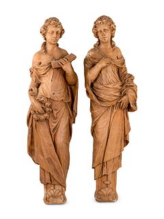 A Pair of Terra Cotta Corbel Figures