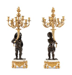 A Fine Pair of Large Louis XVI Style Marble and Parcel Gilt Bronze Figural Seven-Light Candelabra