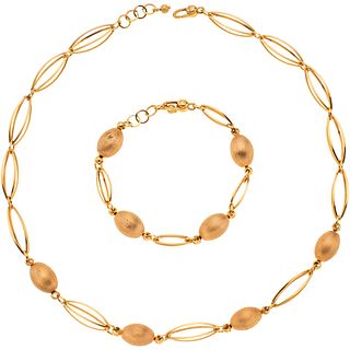 Set of choker and bracelet in 14k yellow gold. Weight: 31.5 g