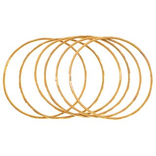Six bracelets in 18k gold. Diameter: 2.4" (6.3 cm). Total weight: 45.8 g