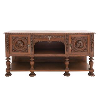 Sideboard. 20th century. Carved in wood. Spanish style. With drawer, shelf and 2 doors. 38.5 x 77 x 21.2" (98 x 196 x 54 cm)