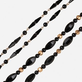 Two Victorian black onyx and gold necklaces