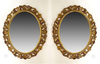 Pair of Early 20th Century Carved and Giltwood Mirrors