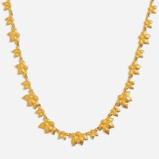 Gold lotus necklace