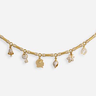 Diamond and gold charm bracelet