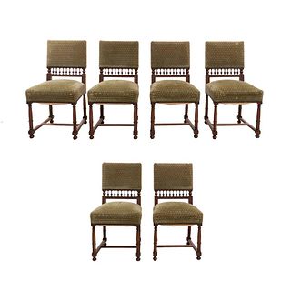 Lote de 6 sillas. Francia. SXX. Estilo Enrique II. En madera de nogal. Con respaldos semiabiertos y asientos en tapicería geométrica.