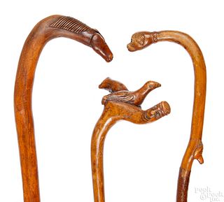 Three carved canes